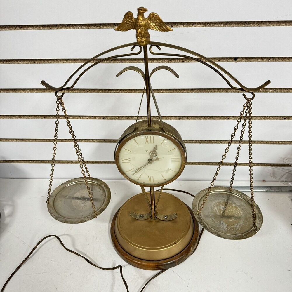 Vintage United Metal Goods Mfg. Scale Of Justice Electric Table Top Clock No 207